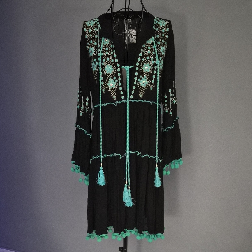 Chic Black Dress with Turquoise Detailing